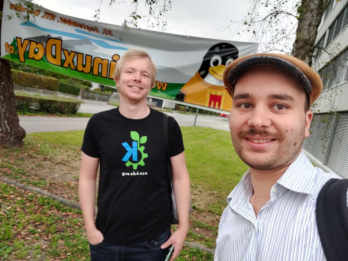Me and Tobias in front of the LinuxDays poster at the entrance of the event