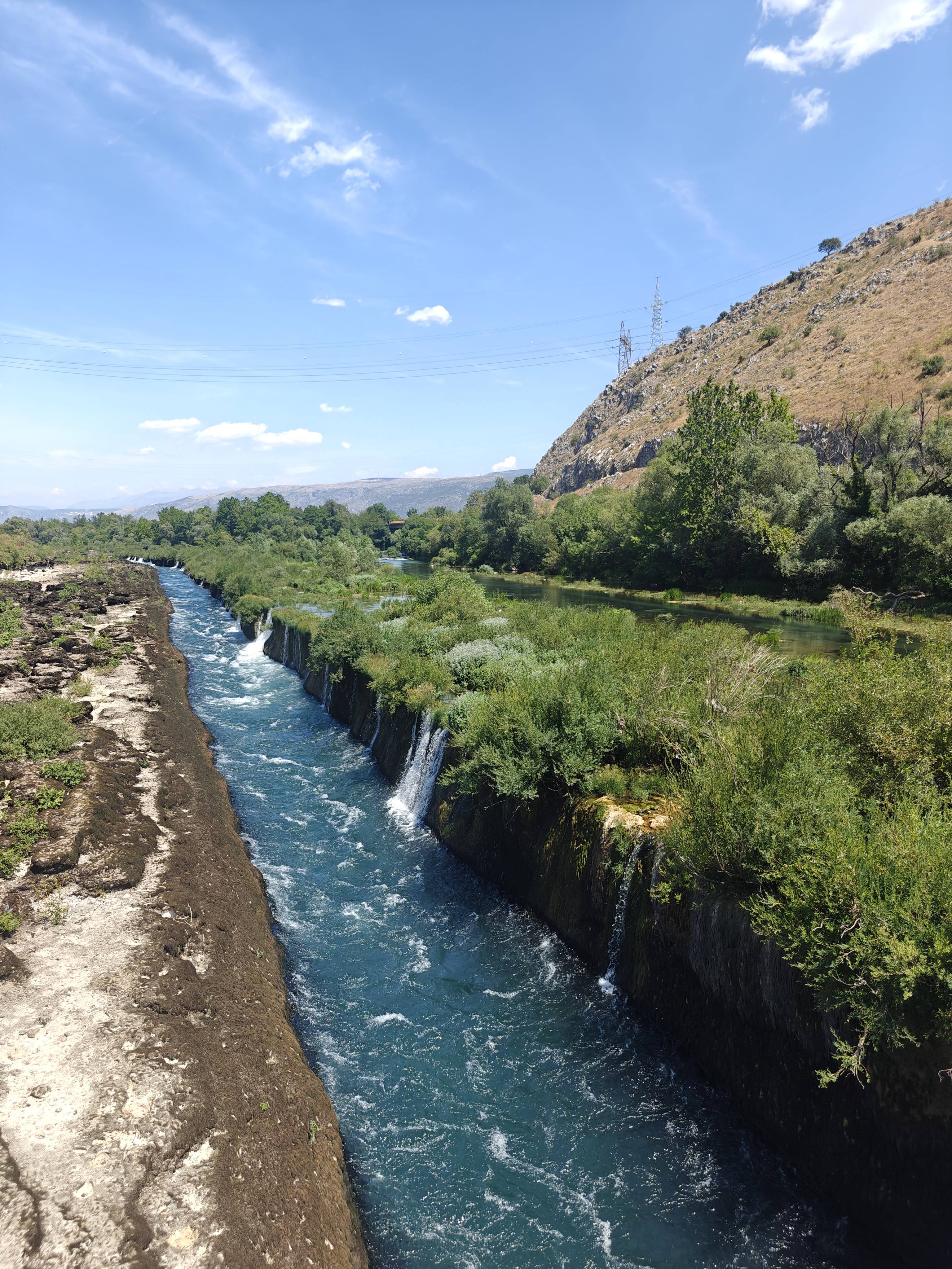 Two rivers merging together and creating some waterfalls